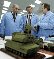 Vladimir Putin (l) and Vladimir Evtushenko